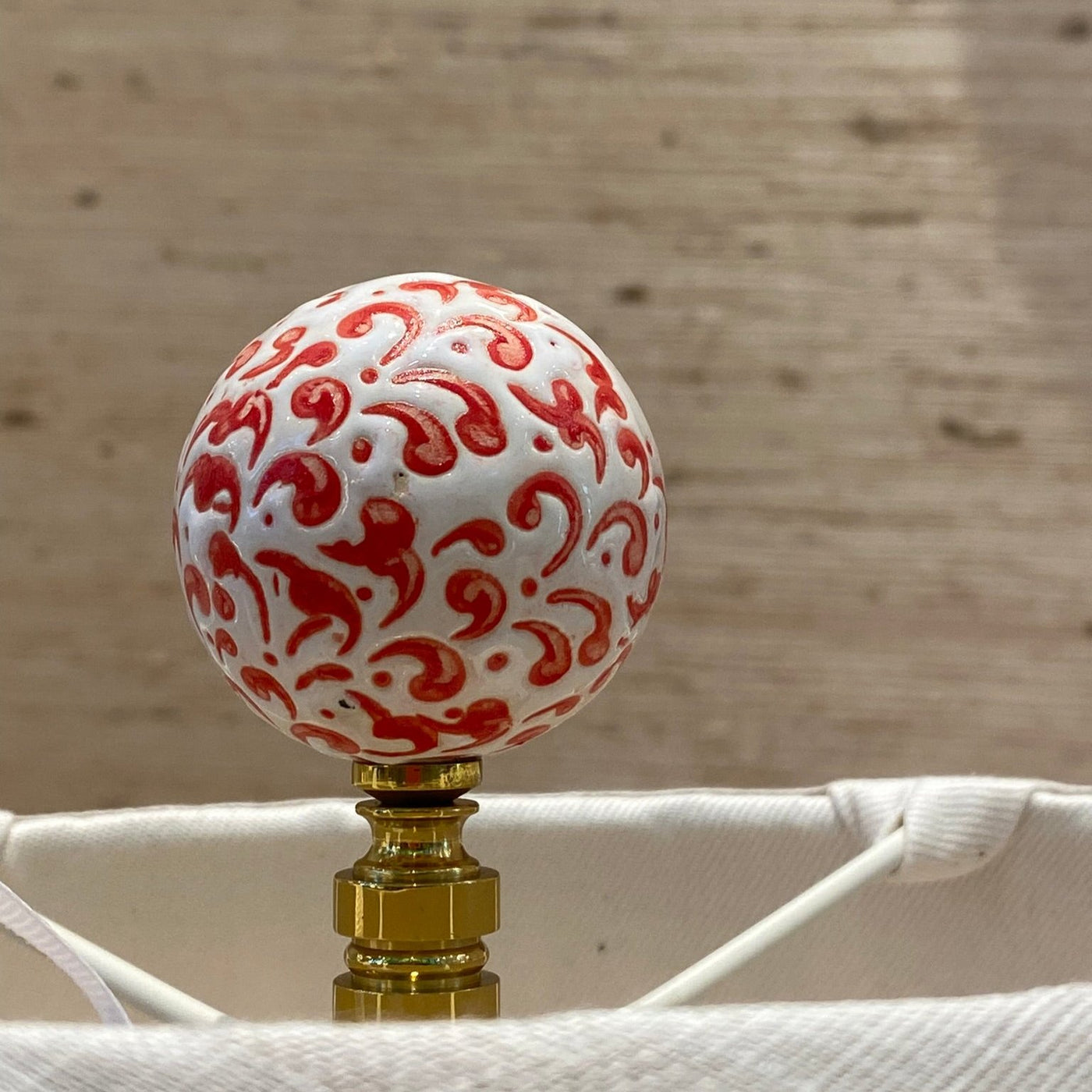 red and white ball finial