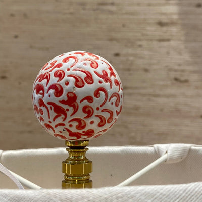 red and white ball finial