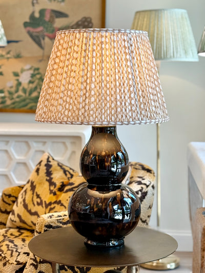 Fermoie wicker lampshade on Avebury Table Lamp in Tortoise