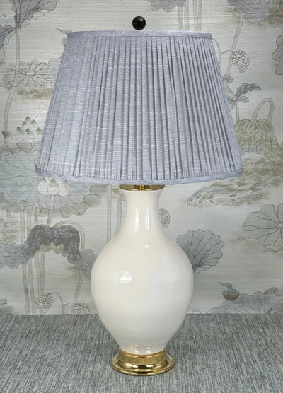 Black Porcelain lamp finial styled with a Fermoie strie lampshade on a Paul Schneider Athens ceramic lamp.