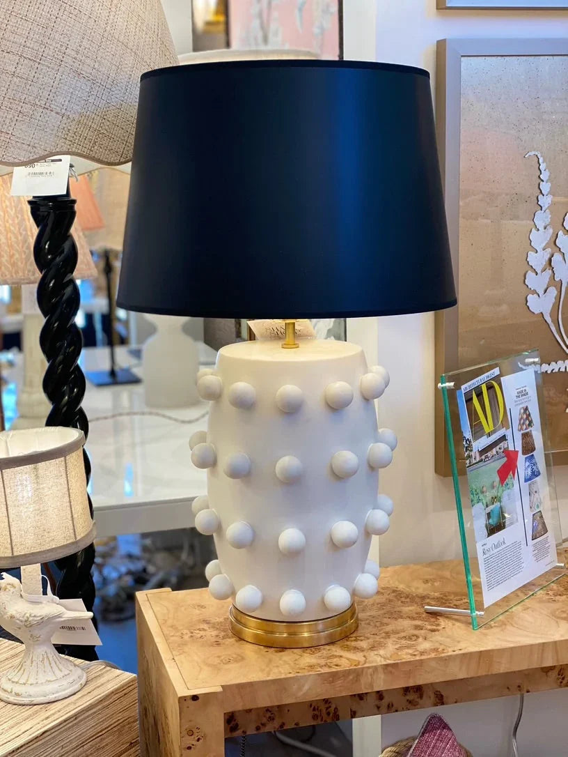 Black empire lamp shade on a white lamp