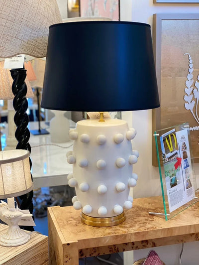 Black empire lamp shade on a white lamp