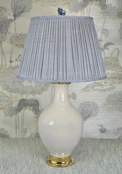 Blue Foo Dog lamp finial styled with a Fermoie strie lampshade on a Paul Schneider Athens ceramic lamp