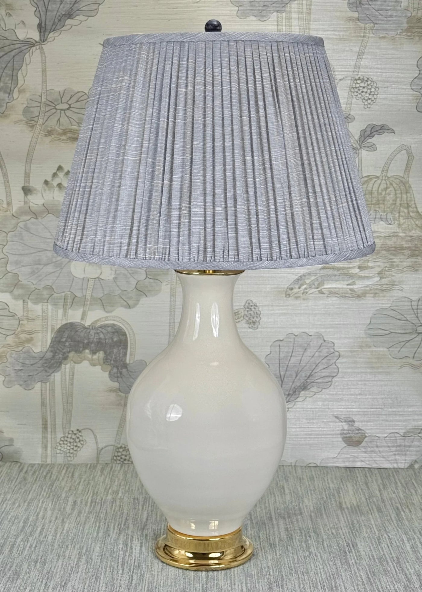 Blue Sodalite Stone Ball Finial styled with a Fermoie strie lampshade on a Paul Schneider Athens ceramic lamp