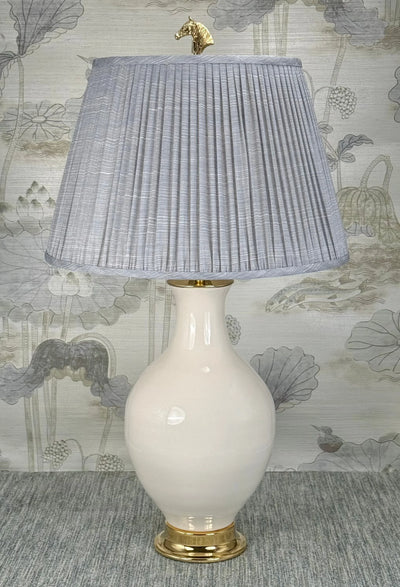 Brass Horse Head    lamp finial styled with a Fermoie strie lampshade on a Paul Schneider Athens ceramic lamp