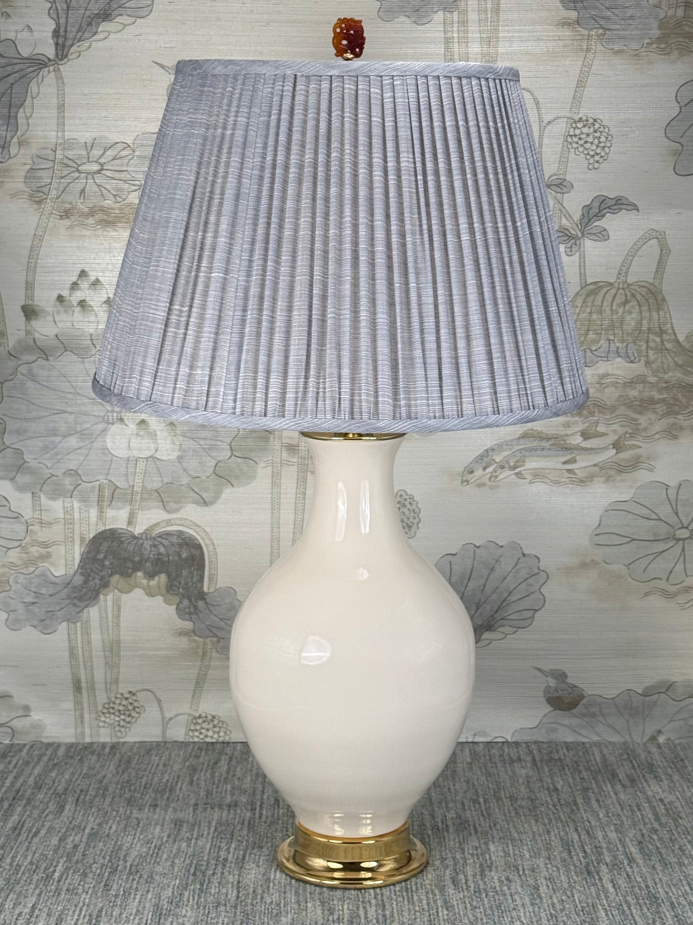 Caramel/Red Carnelian Dragon lamp finial styled with a Fermoie strie lampshade on a Paul Schneider Athens ceramic lamp