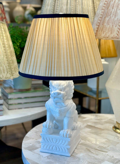 Caramel Sari Lampshade with Navy Silk Trim on Porcelain White Foo Dog Table Lamp