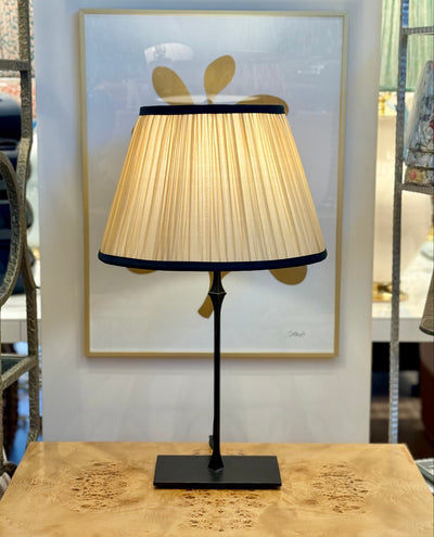 Caramel Sari Lampshade with Navy Silk Trim on Dauphine Bedside Lamp in aged Iron
