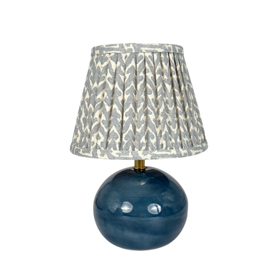 Charlie Mini Blue Porcelain Lamp paired with a fermoie lampshade