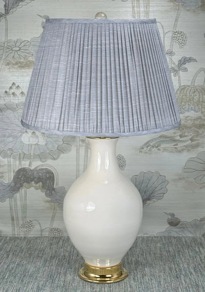 Clear Acrylic Ball lamp finial styled with a Fermoie strie lampshade on a Paul Schneider Athens ceramic lamp