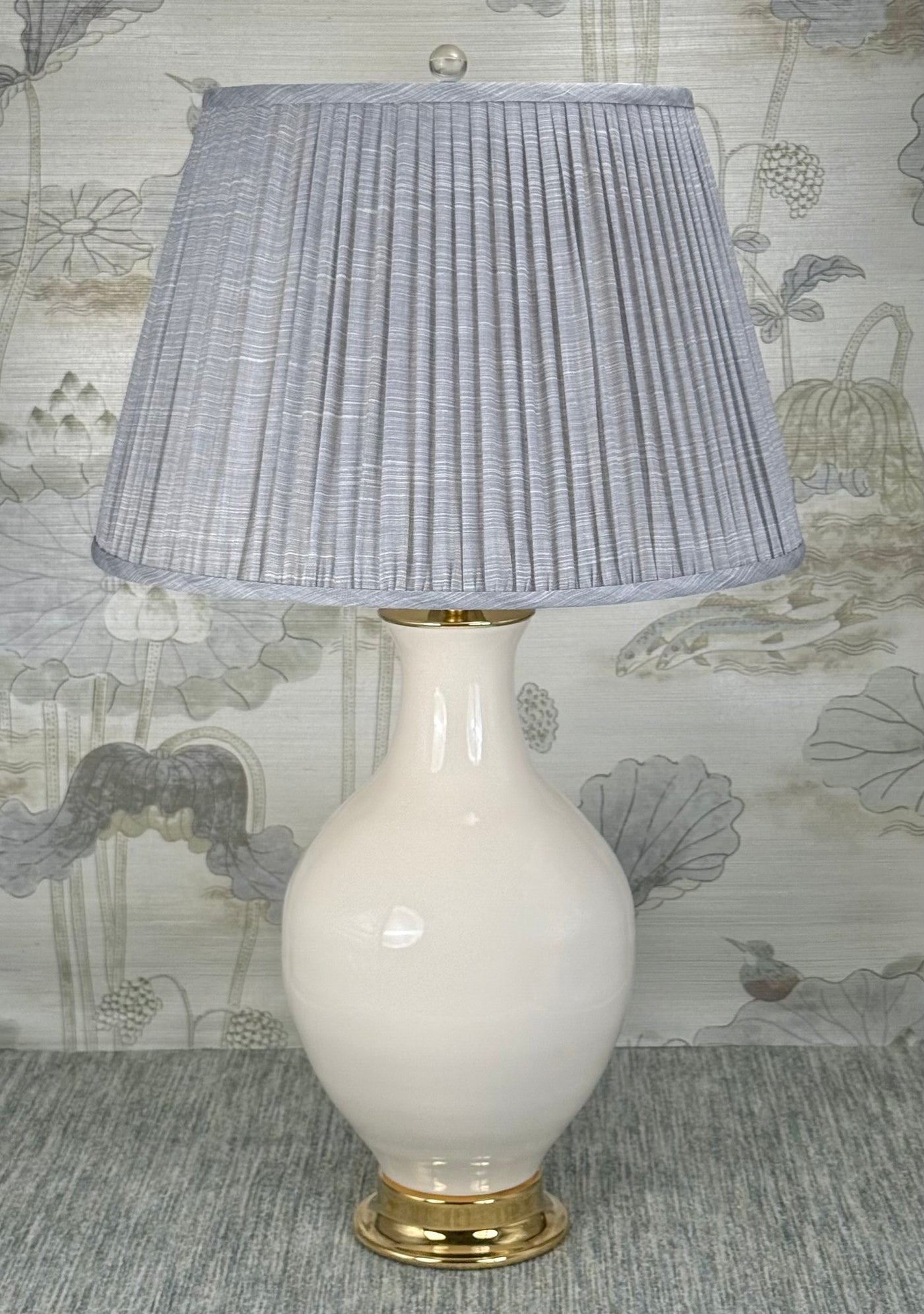 Clear Crystal Ball 25mm Polished Brass base  lamp finial styled with a Fermoie strie lampshade on a Paul Schneider Athens ceramic lamp