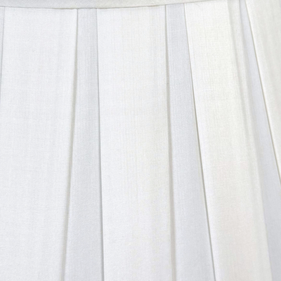 Close-up of white pleated fabric
