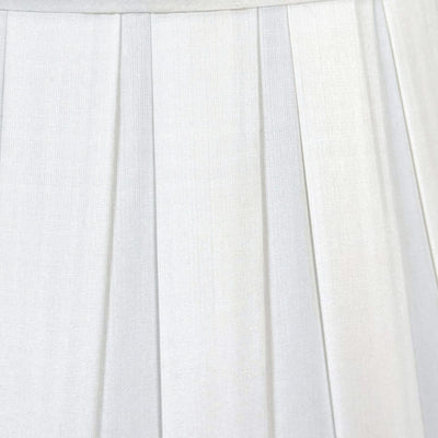 Close-up of white pleated fabric