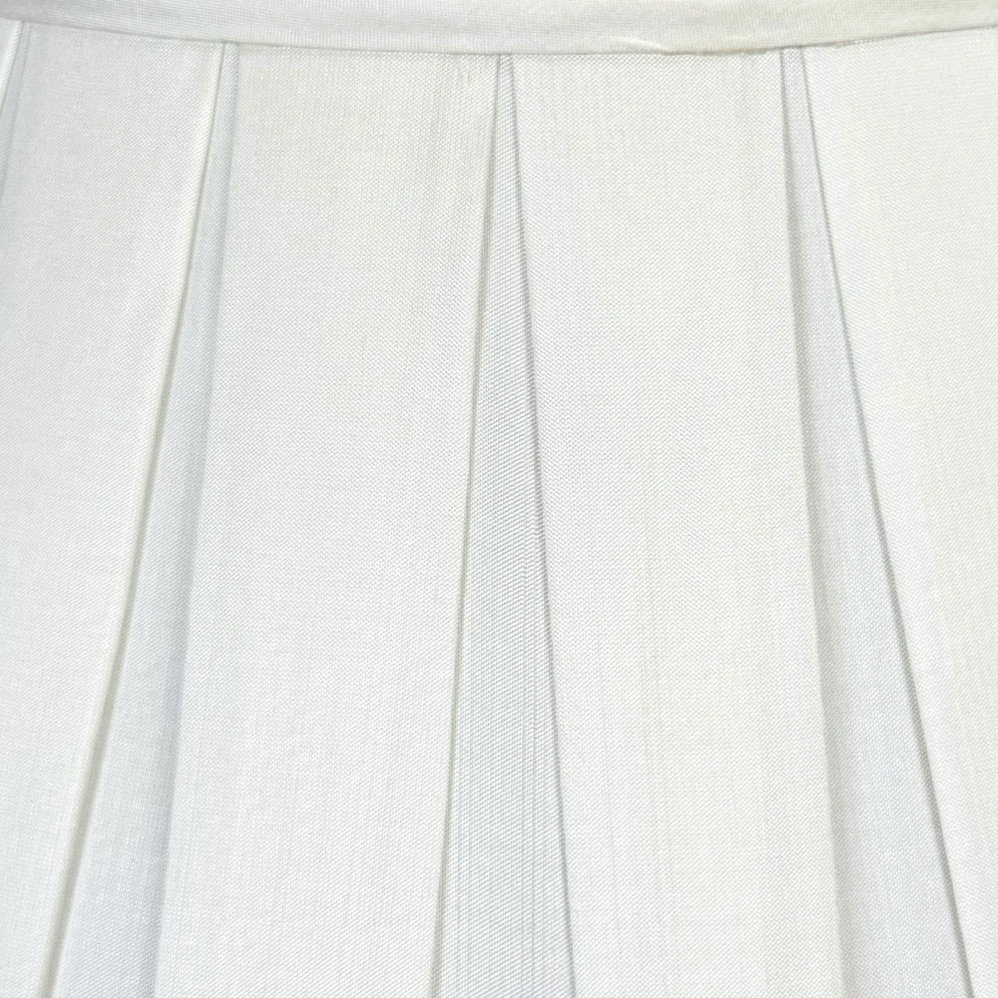 Close-up of a white fabric with pleated texture