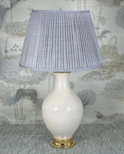 Column Style Brass Finial in Nickel Plated Brass styled with a Fermoie strie lampshade on a Paul Schneider Athens ceramic lamp.