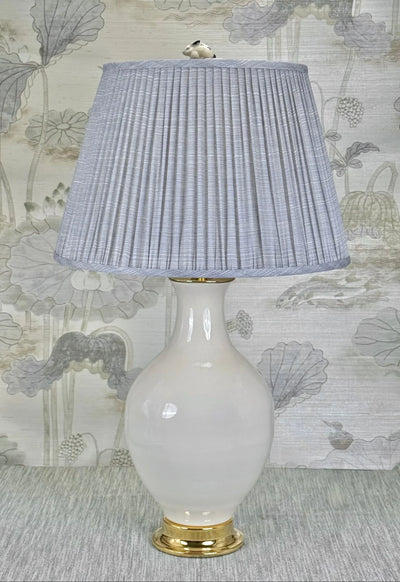Crouching Bunny Finial styled with a Fermoie strie lampshade on a Paul Schneider Athens ceramic lamp