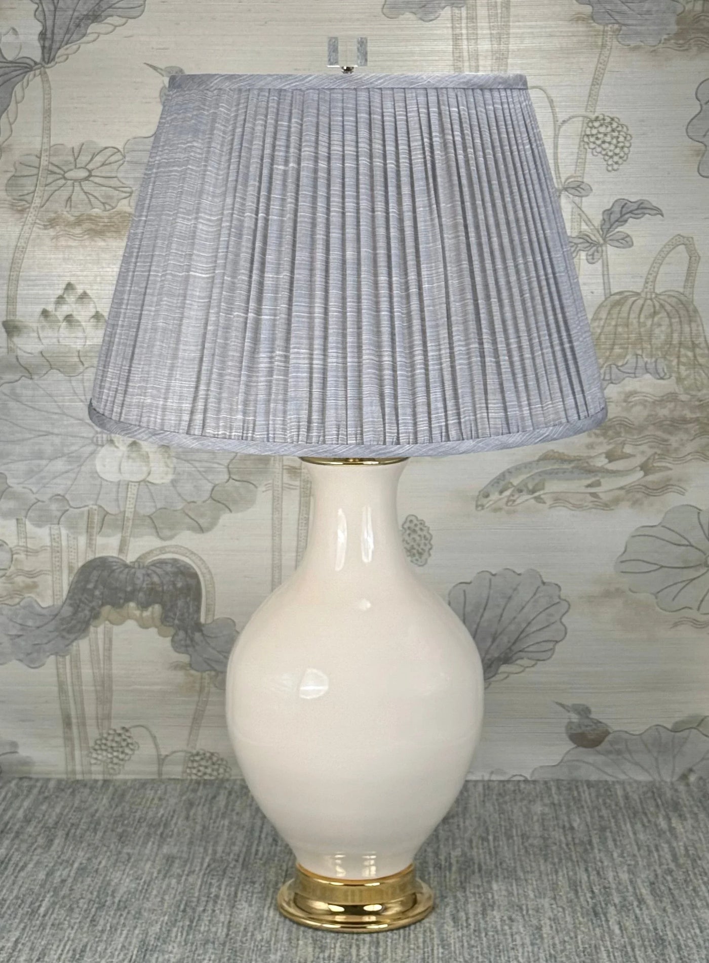 Crystal Cube Finial with Polished Nickel Base styled with a Fermoie strie lampshade on a Paul Schneider Athens ceramic lamp