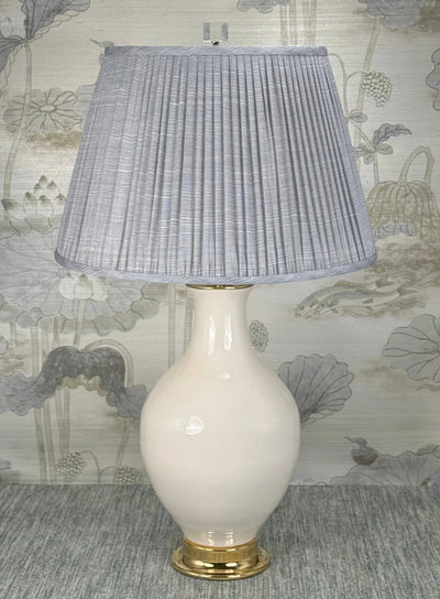 Crystal Cube Finial with Polished Nickel Base styled with a Fermoie strie lampshade on a Paul Schneider Athens ceramic lamp