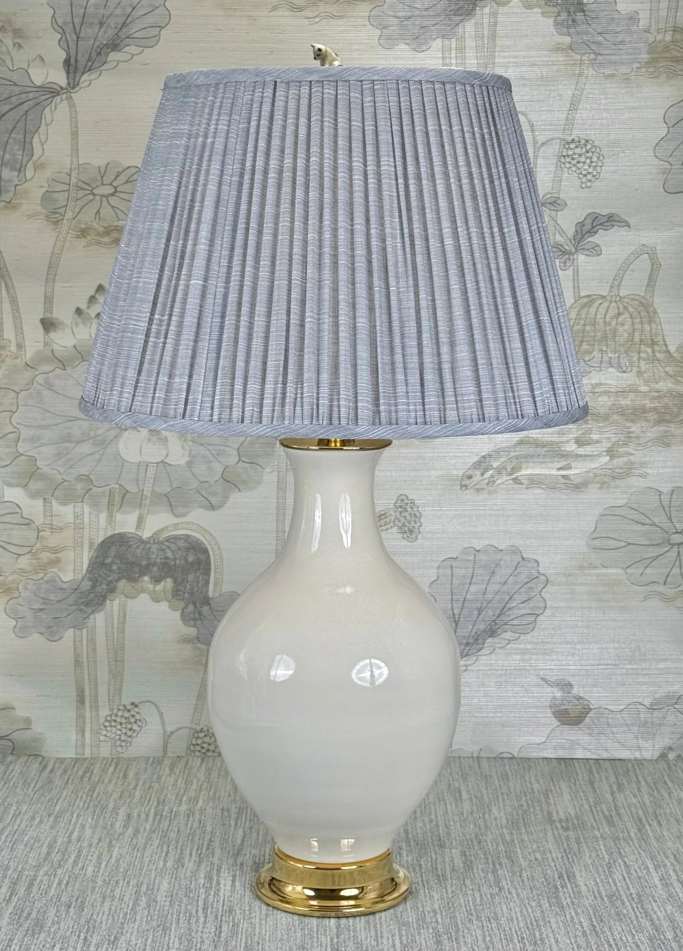 Curious Kitty lamp finial styled with a Fermoie strie lampshade on a Paul Schneider Athens ceramic lamp