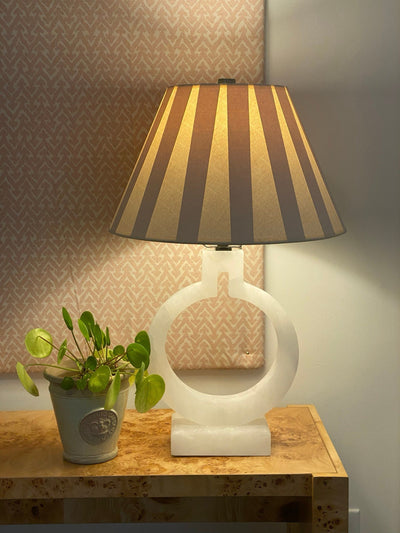 Box pleat paper lampshade and alabaster lamp