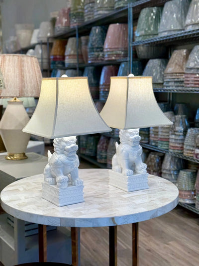 Egg Linen Square Bell Lampshade paired with Porcelain White Foo Dog Table Lamps