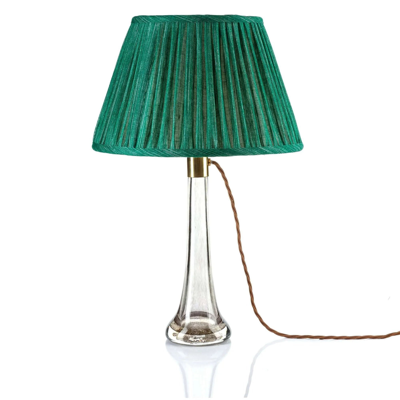 Luxurious green pleated empire lampshade in Fermoie fabric, displayed on various high-end lamps, perfect for enhancing classic and modern interior spaces.