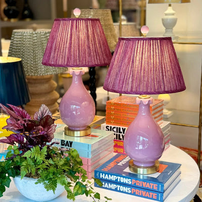 Luxury Fermoie Back to the Fuchsia pleated empire lampshades in deep pink, displayed on lavender lamps.