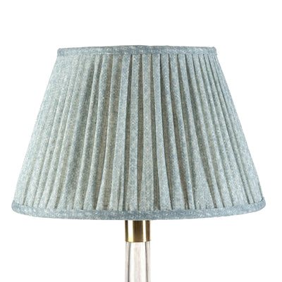Front view of designer empire gathered lampshade in blue Fermoie fabric, featuring a pleated design and soft floral pattern, ideal for adding a touch of elegance to modern and traditional interiors