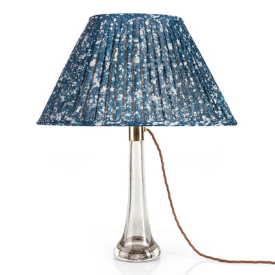 Front view of luxury Fermoie Blue Quartz oval lampshade with a speckled blue and white pattern, featuring designer pleated detailing for high-end interiors