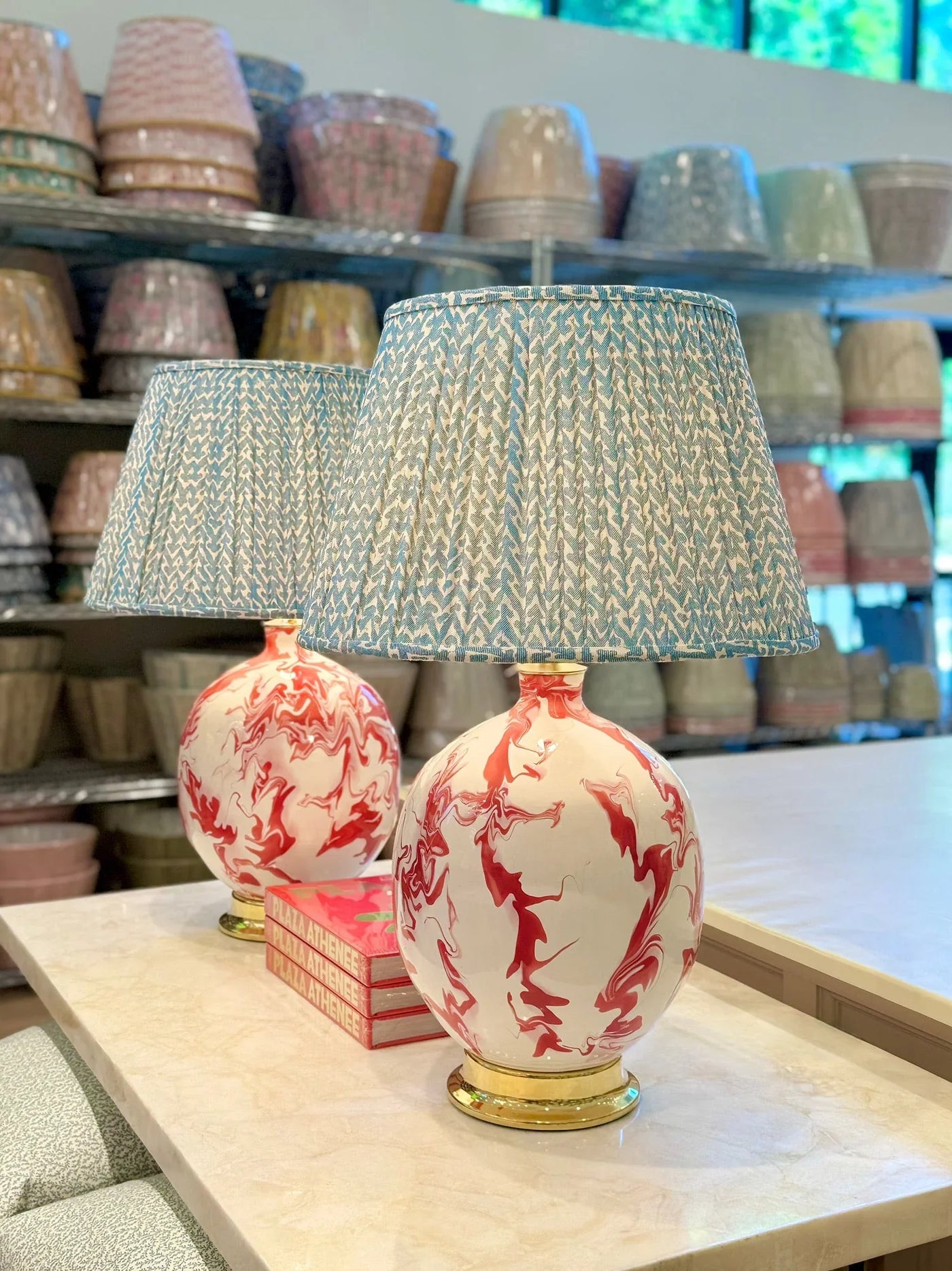 Luxury designer Fermoie Blue Rabanna gathered empire lampshade with pleated detailing displayed on Red Marfa Lamps