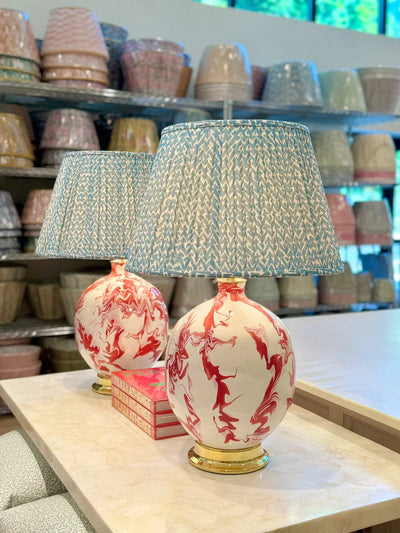 Luxury designer Fermoie Blue Rabanna gathered empire lampshade with pleated detailing displayed on Red Marfa Lamps