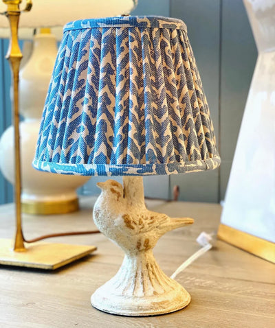 Luxury designer Fermoie Blue Rabanna gathered empire lampshade with pleated detailing displayed on a mini bird lamp