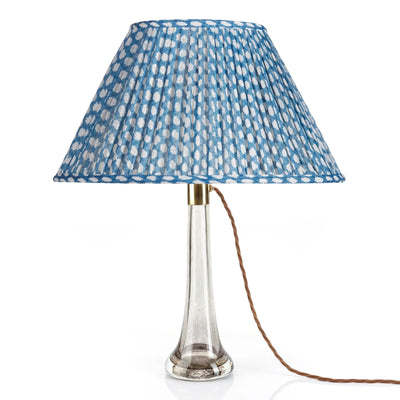 Front view of luxury designer Fermoie Blue Wicker gathered empire oval lampshade with blue and white woven pattern