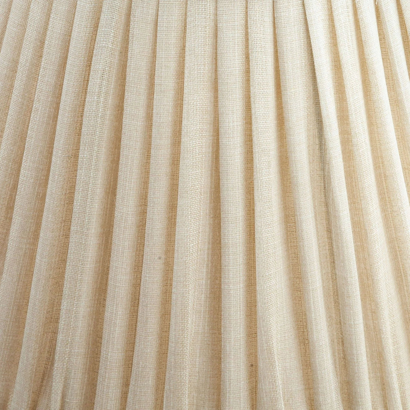 Close-up of Fermoie Cream Moire fabric with pleated detailing and subtle cream texture, showcasing high-end craftsmanship