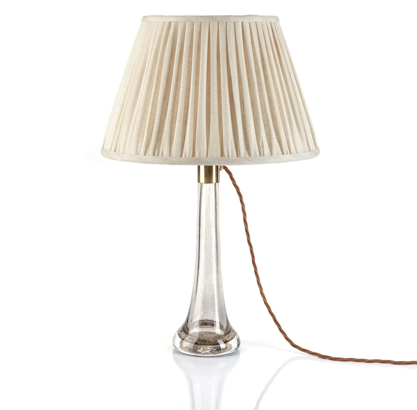 Luxury designer Fermoie Cream Moire empire lampshade with pleated  white cream linen fabric displayed on a clear glass lamp