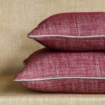 Fermoie cushion stack in Back to the Fuchsia fabric linen
