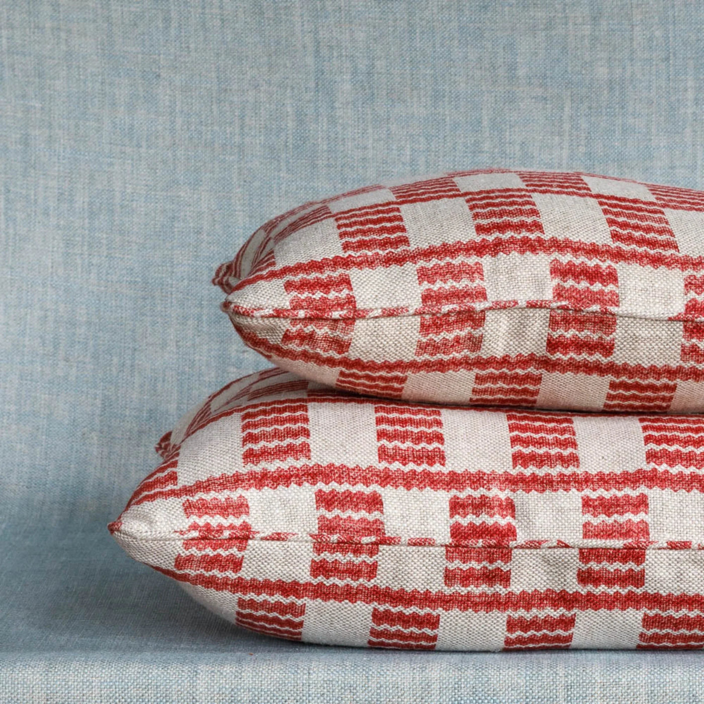 Designer Fermoie cushion stack in Red Cove linen fabric