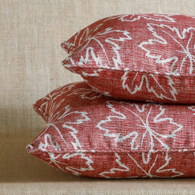 Designer Fermoie cushion stack in Red Maple linen fabric