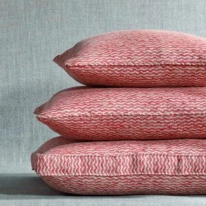 Designer Fermoie cushion stack in Red Popple linen fabric