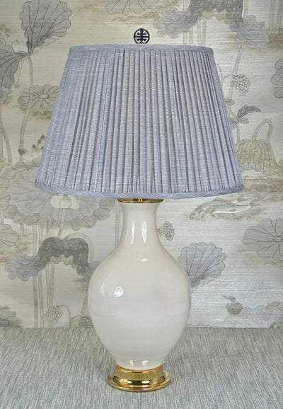Genuine Blue Sodalite Good Luck lamp finial styled with a Fermoie strie lampshade on a Paul Schneider Athens ceramic lamp