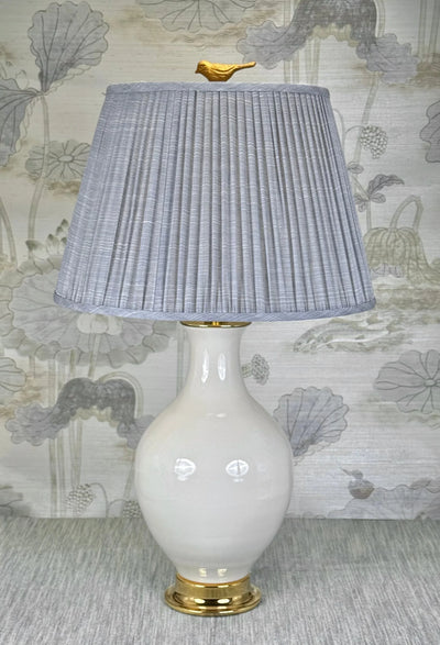 Gold Bird lamp finial styled with a Fermoie strie lampshade on a Paul Schneider Athens ceramic lamp.