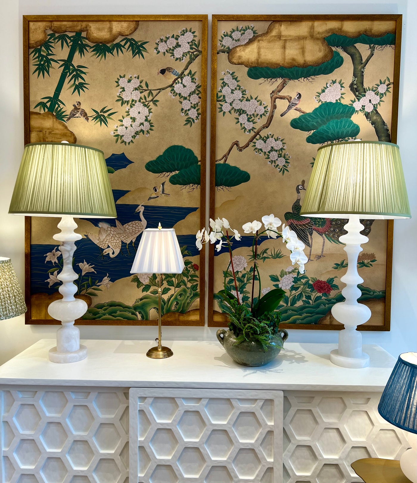 Green silk shirred lampshades on alabaster lamps