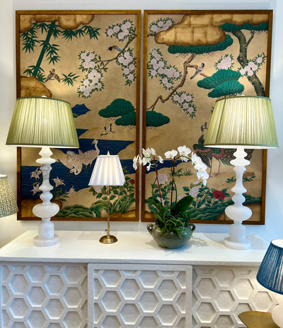Green silk shirred lampshades on alabaster lamps