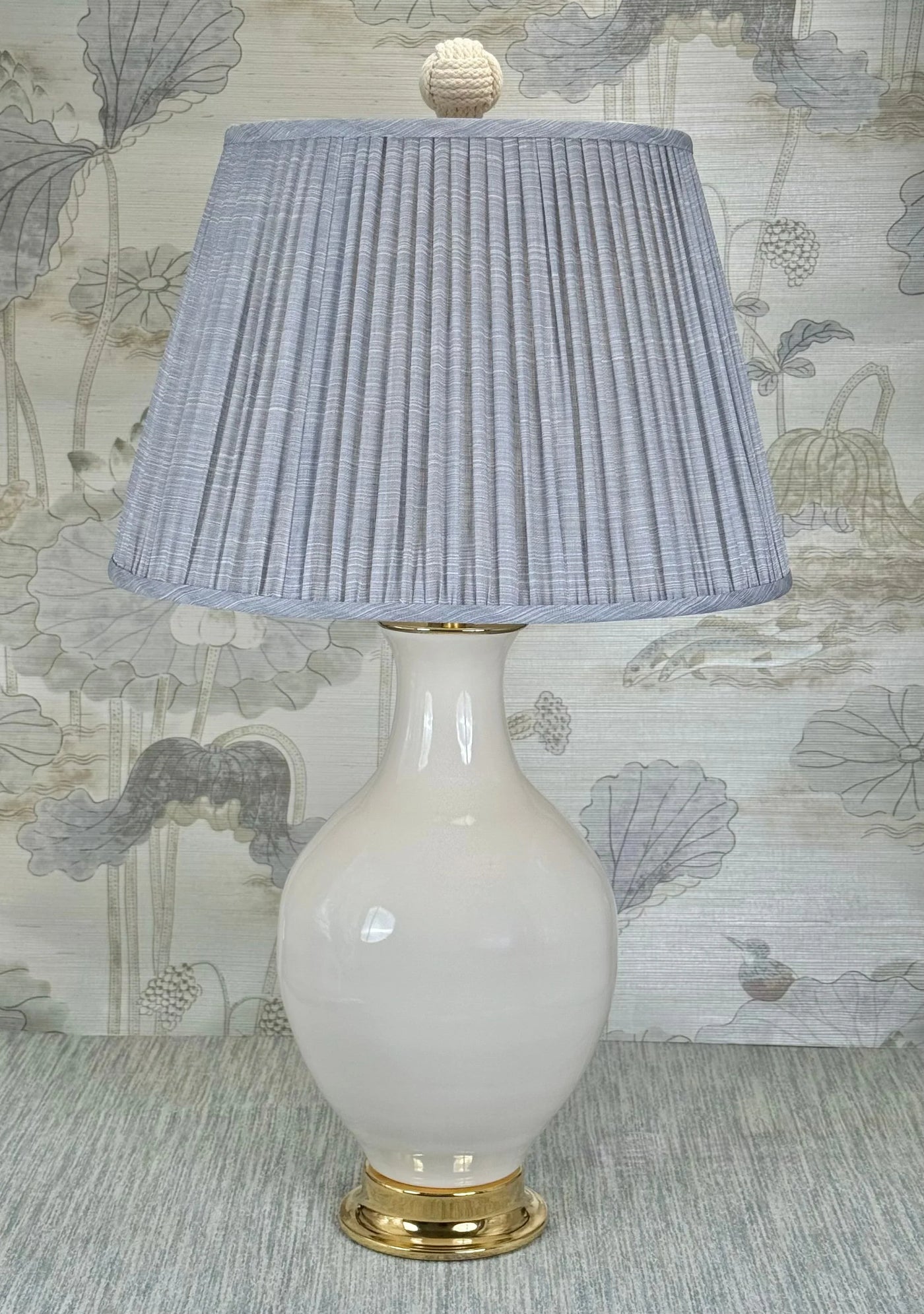 Hand Woven Rope Ball lamp finial styled with a Fermoie strie lampshade on a Paul Schneider Athens ceramic lamp.