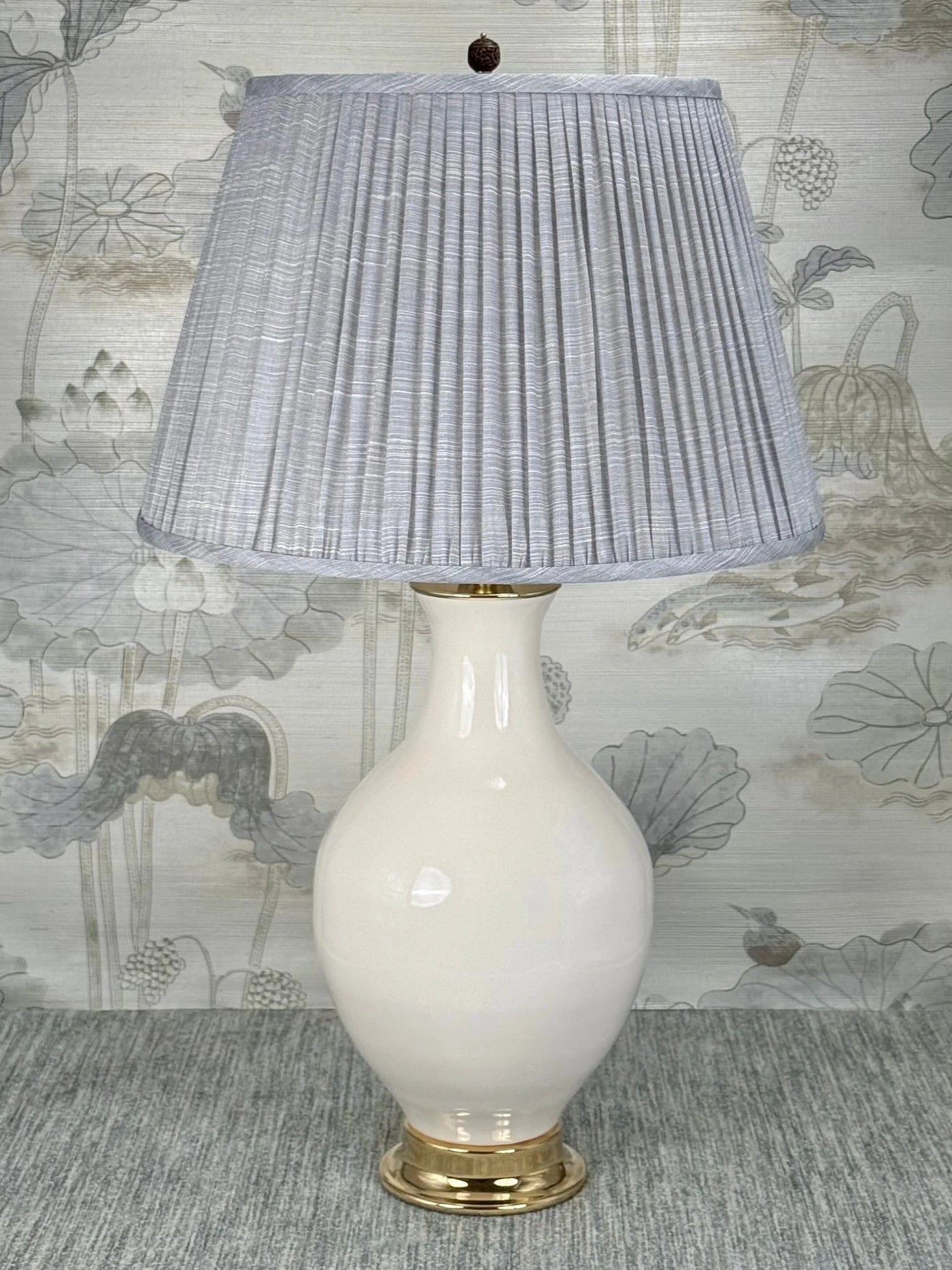 Hand Carved Genuine Bone lamp finial styled with a Fermoie strie lampshade on a Paul Schneider Athens ceramic lamp