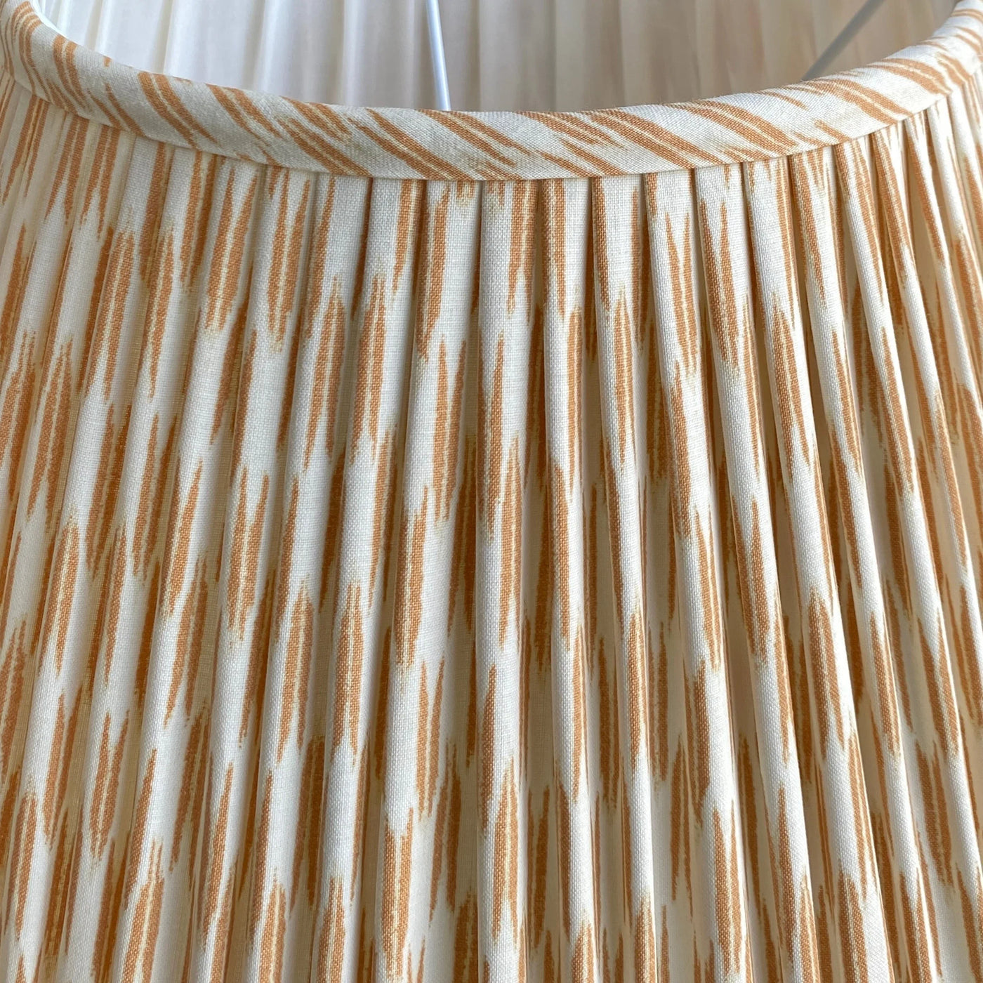 White and tan lampshade