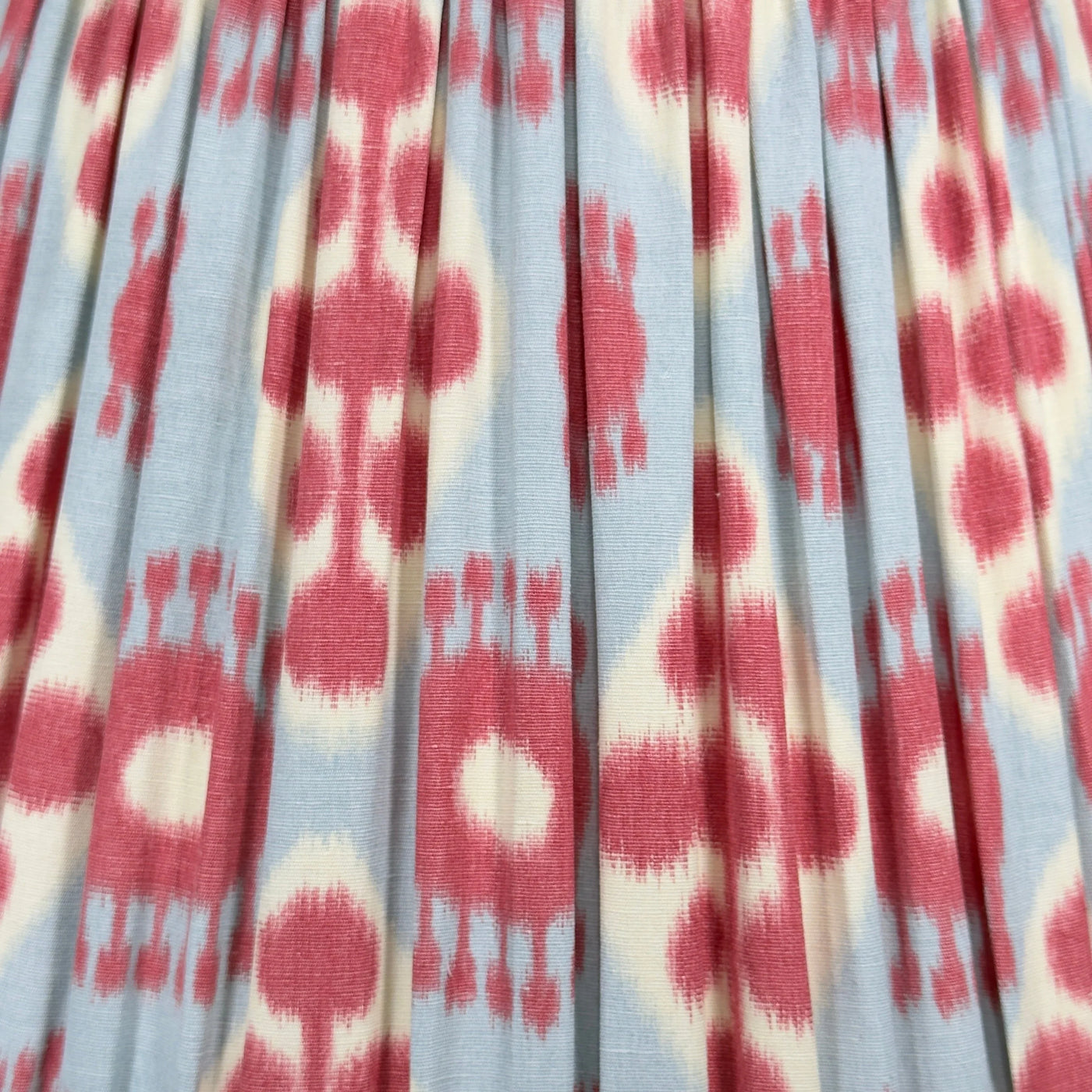 Up close Schumacher Hamilton Ikat in Sky Blue & Cherry Red Fabric Lampshade