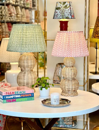 Pink and Green Fermoie Lampshades on wicker lamps
