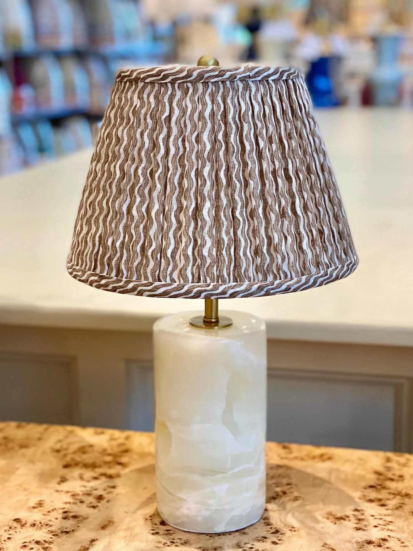 Fermoie Nut Brown Popple Lampshade on an alabaster lamp