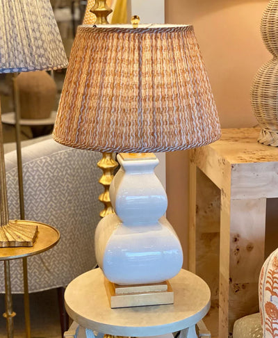 Fermoie Orange Popple Lampshade on a white ceramic lamp